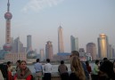 Shanghai skyline i solnedgång