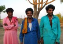 Even the men is dressed in colorful clothes