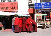 Monks at the Jokhang square in Lhasa