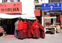 Monks at the Jokhang square in Lhasa
