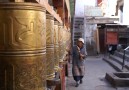Women next to a praying wheels
